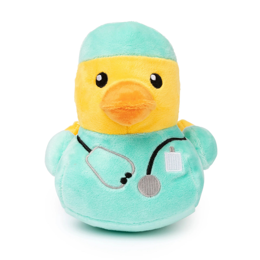 Plush duck dog toy dressed as a doctor with a stethoscope and medical scrubs on a white background