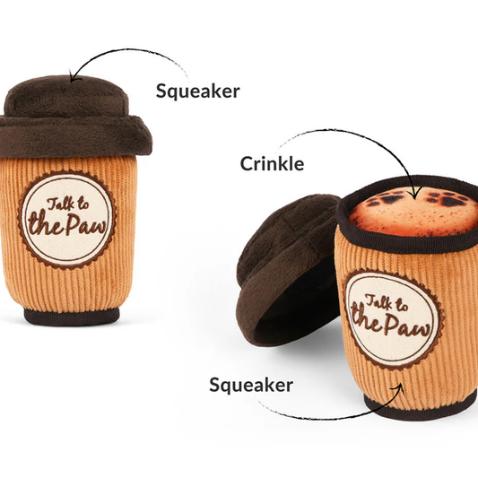 Dog toy resembling a coffee cup with labeled squeaker and crinkle features on a white background.